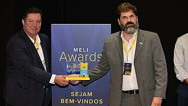 Jucélio Joly and André Luiz Sales von Leadec mit dem Meli Award.